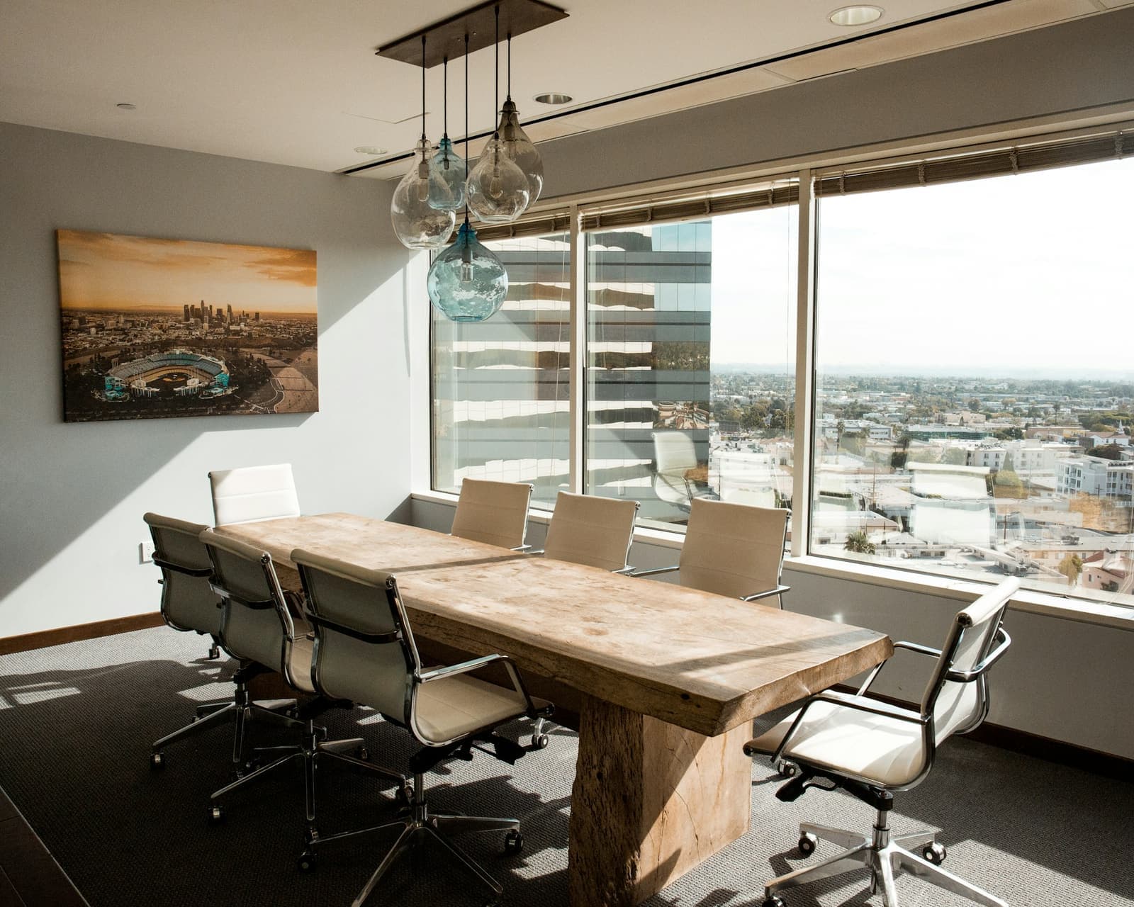 A bright conference room set up for a full-day session